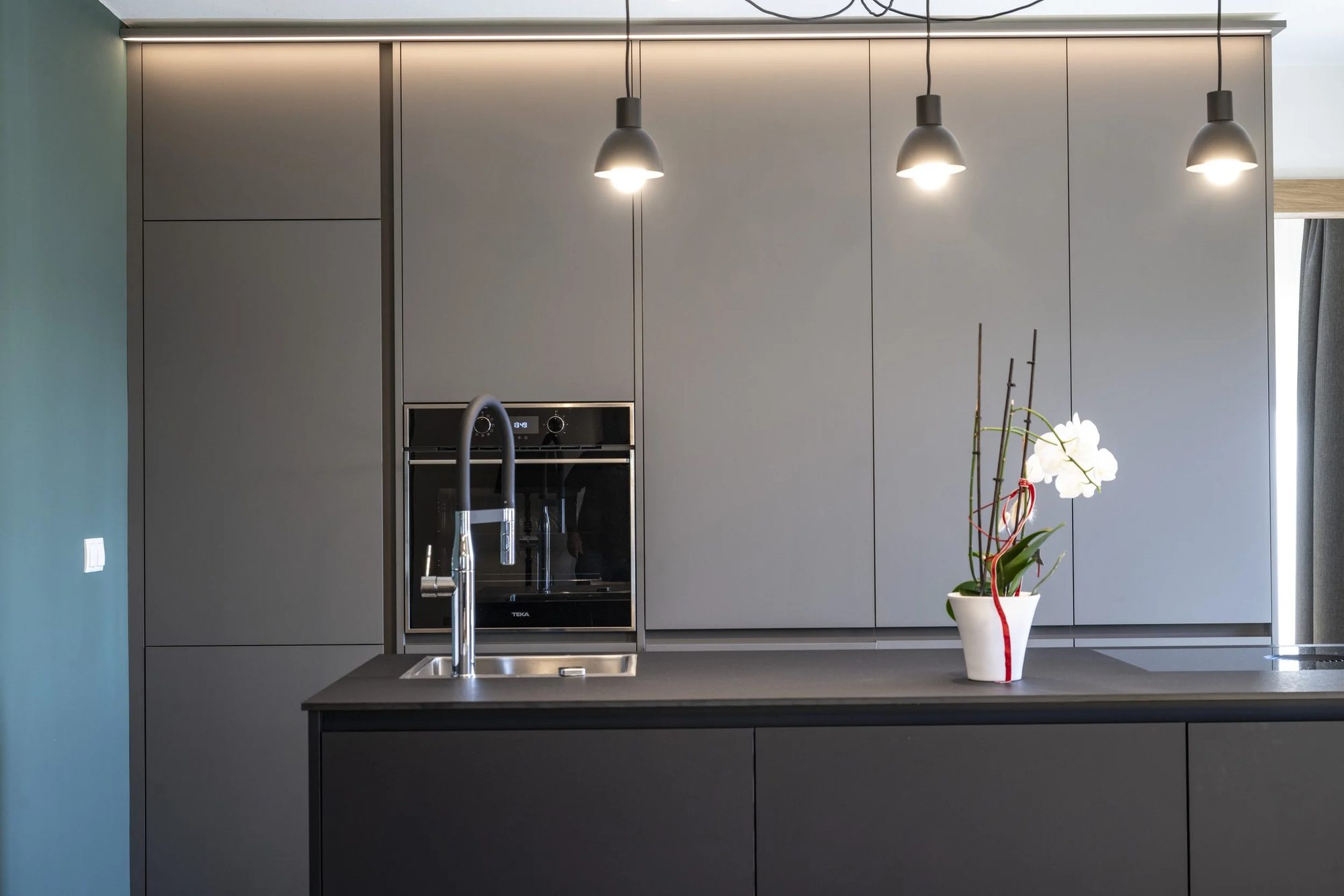 Modern kitchen with gray cabinets
