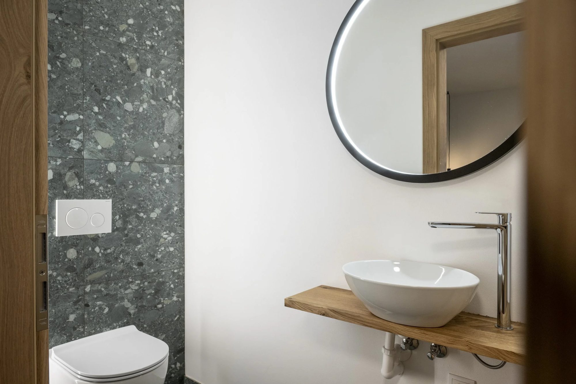 Modern bathroom with a white bowl sink