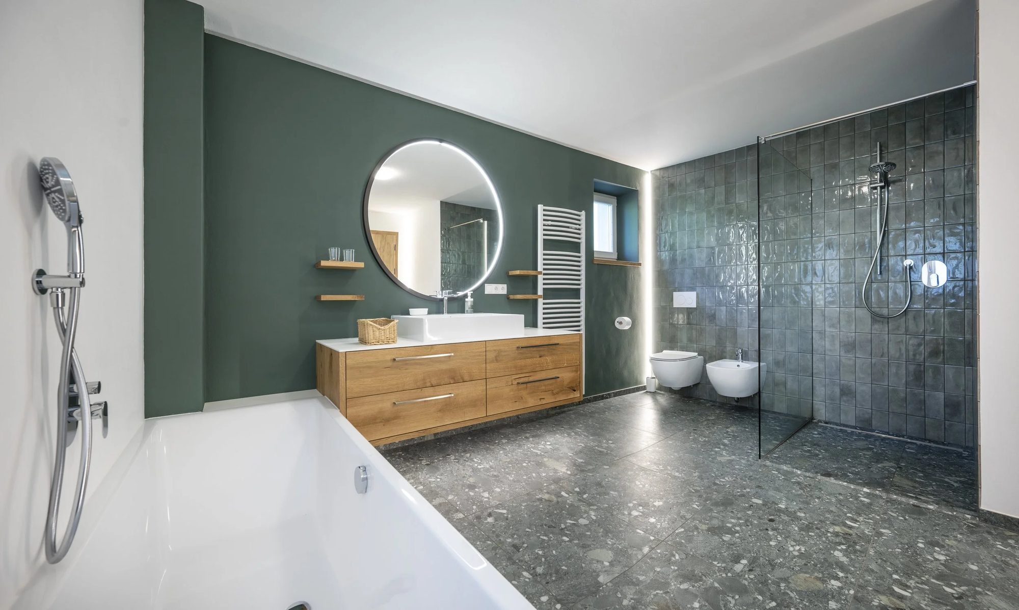 Modern bathroom with a green accent wall
