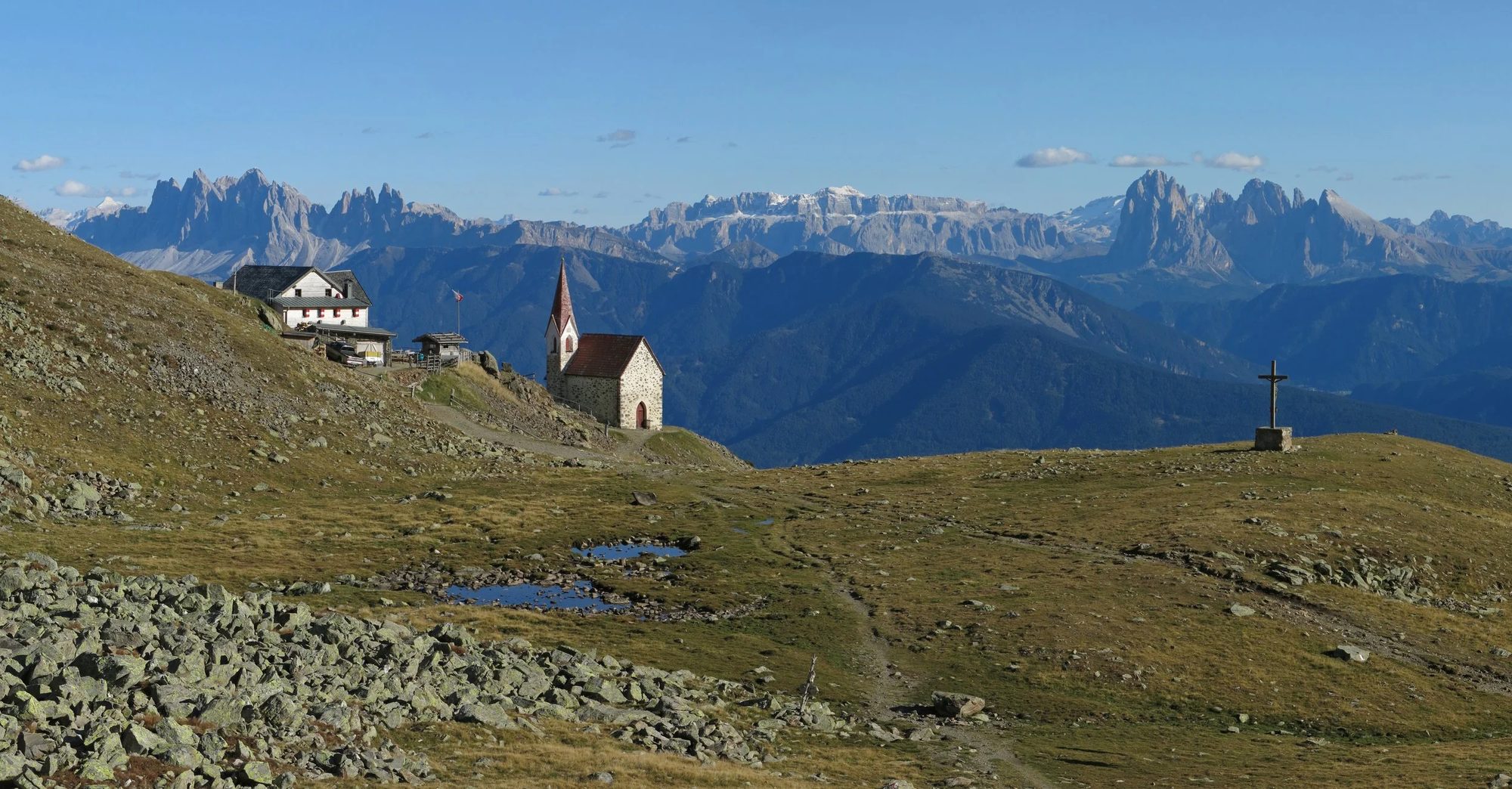 Scenic mountain landscape with a small chapel at Latzfons Cross